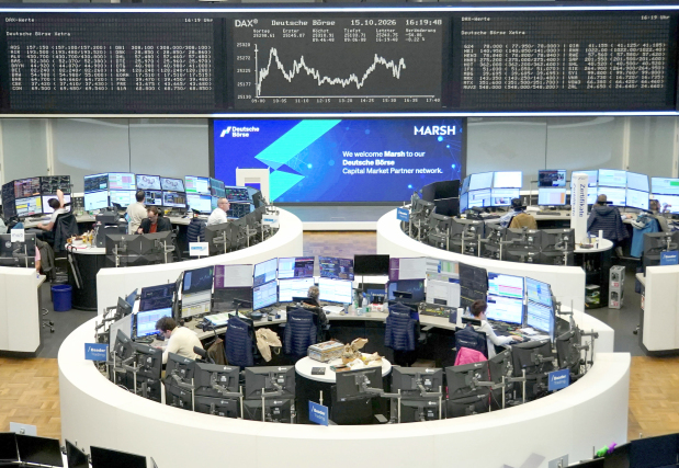 Global stocks edge lower as dollar heads for weekly loss